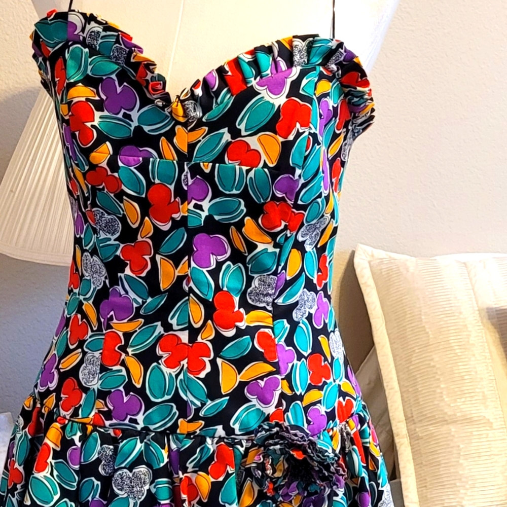Peplum strapless sundress. Approximately 32 inches long, 16 in pit to pit